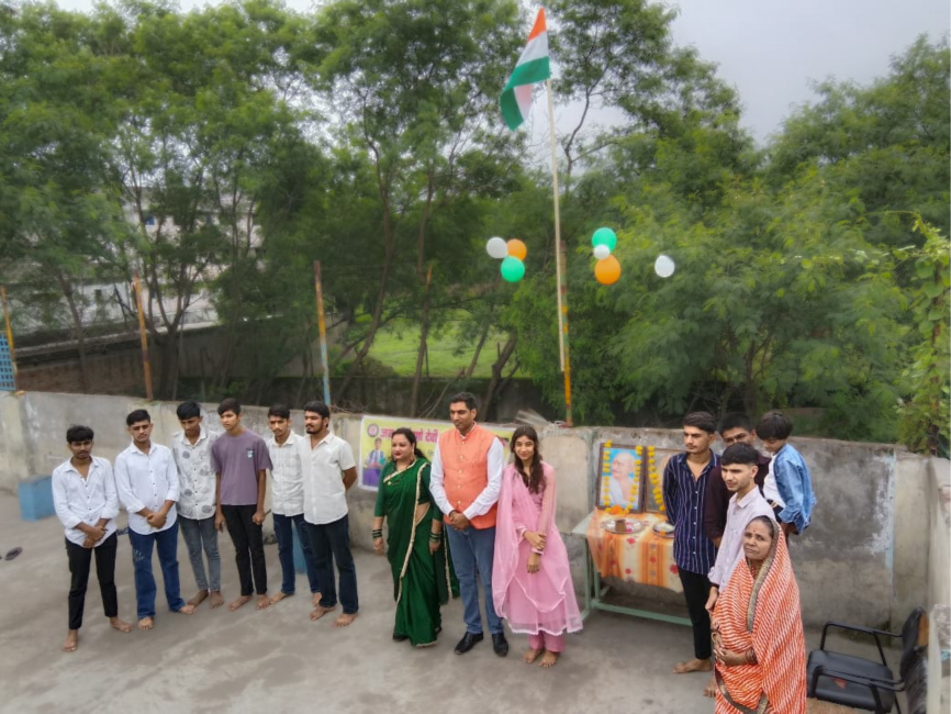 Flag hoisting ceremony with balloons at JMVD Boys Hostel on Independence Day